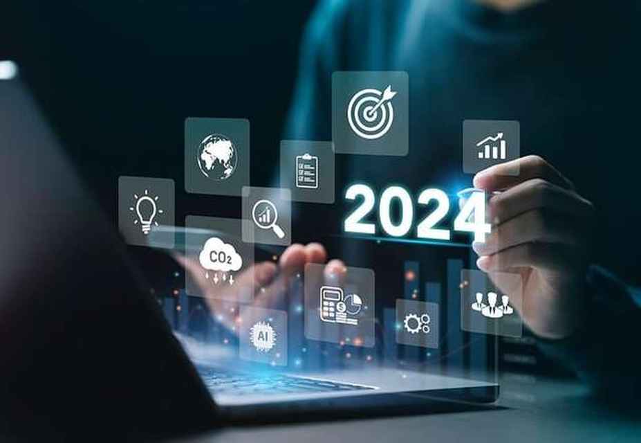 A person interacts with a holographic display showing various icons related to technology, sustainability, and data analysis, with 2024 prominently featured in the center, highlighting insights into brand awareness and social media strategy.